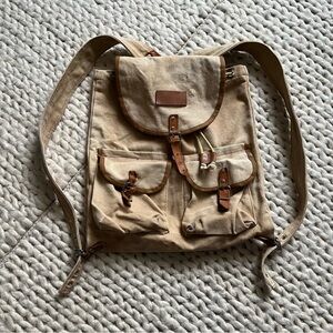 Distressed World Famous Tan Canvas Backpack